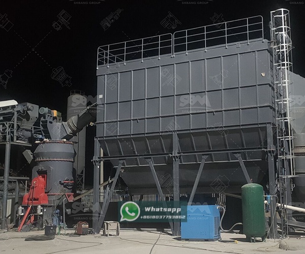 A large LM Vertical Grinding Mill installation in an industrial plant setting