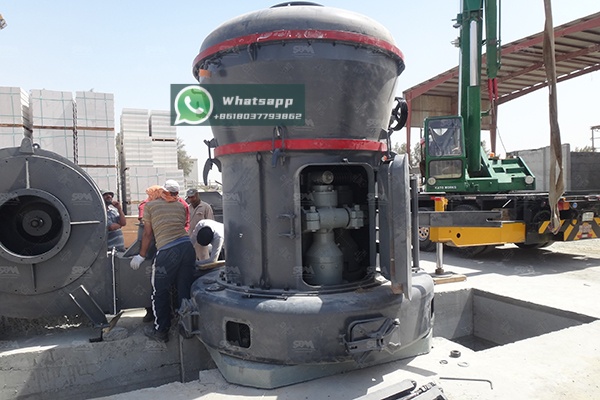 A modern dry mix mortar production line with silos, mixers, and packaging machines