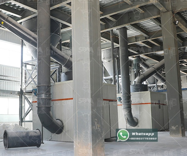 Industrial scene of a LUM Ultrafine Vertical Mill in operation within a modern processing plant