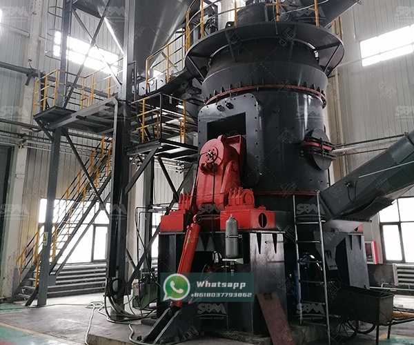 Installation of a large LM Vertical Grinding Mill in an industrial setting