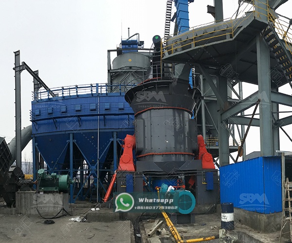 Installation view of a large LM Vertical Grinding Mill in an industrial plant