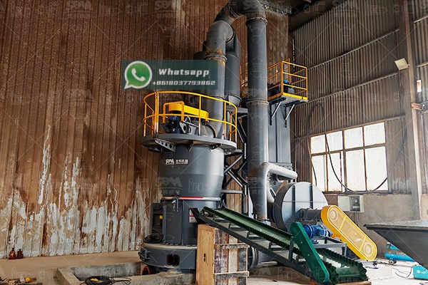 Raymond Mill in operation grinding limestone material