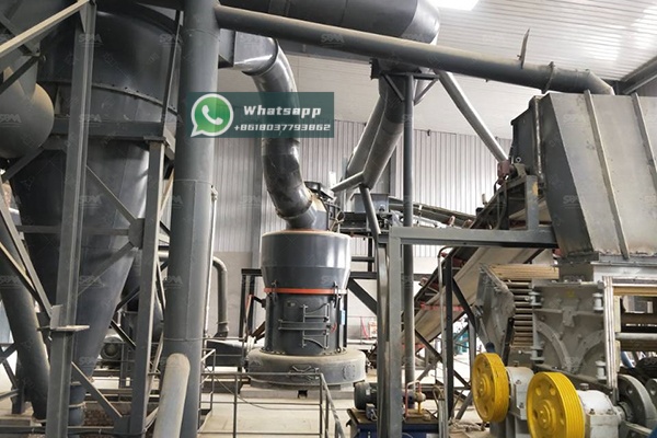 Vertical coal mill in operation showing material flow and control systems