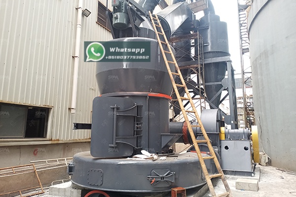 A modern industrial grinding mill installation in a mineral processing plant