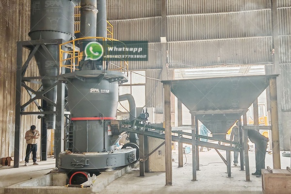 Finished, finely ground bentonite cat litter being poured, demonstrating its low-dust and granular quality.