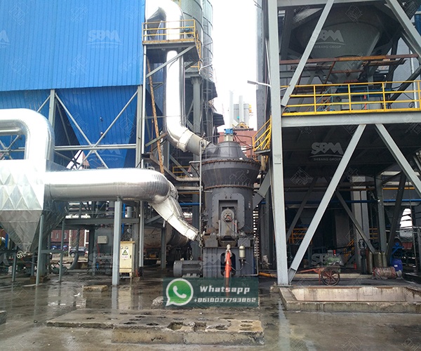 Installation view of a large LM series vertical grinding mill in an industrial plant